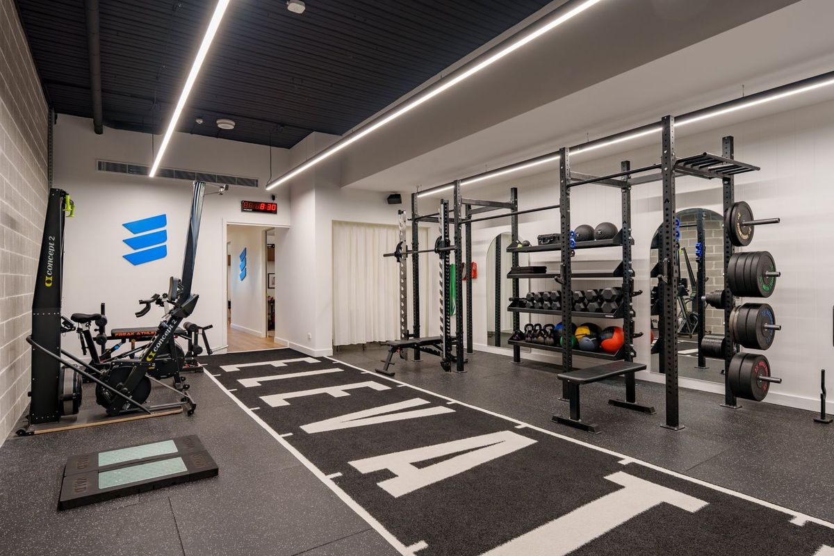 Patient performing supervised rehab exercises with clinician guidance