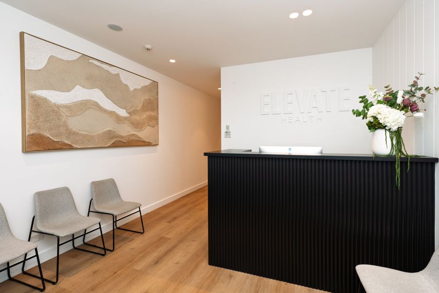 Reception and waiting area at Elevate Health Bella Vista